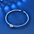 Single Halo Diamond Bangle. 925 Silver